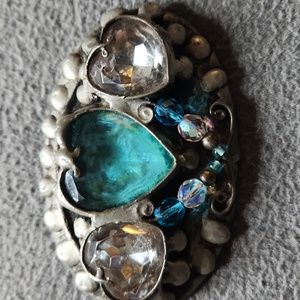 Mikal Winn belt buckle